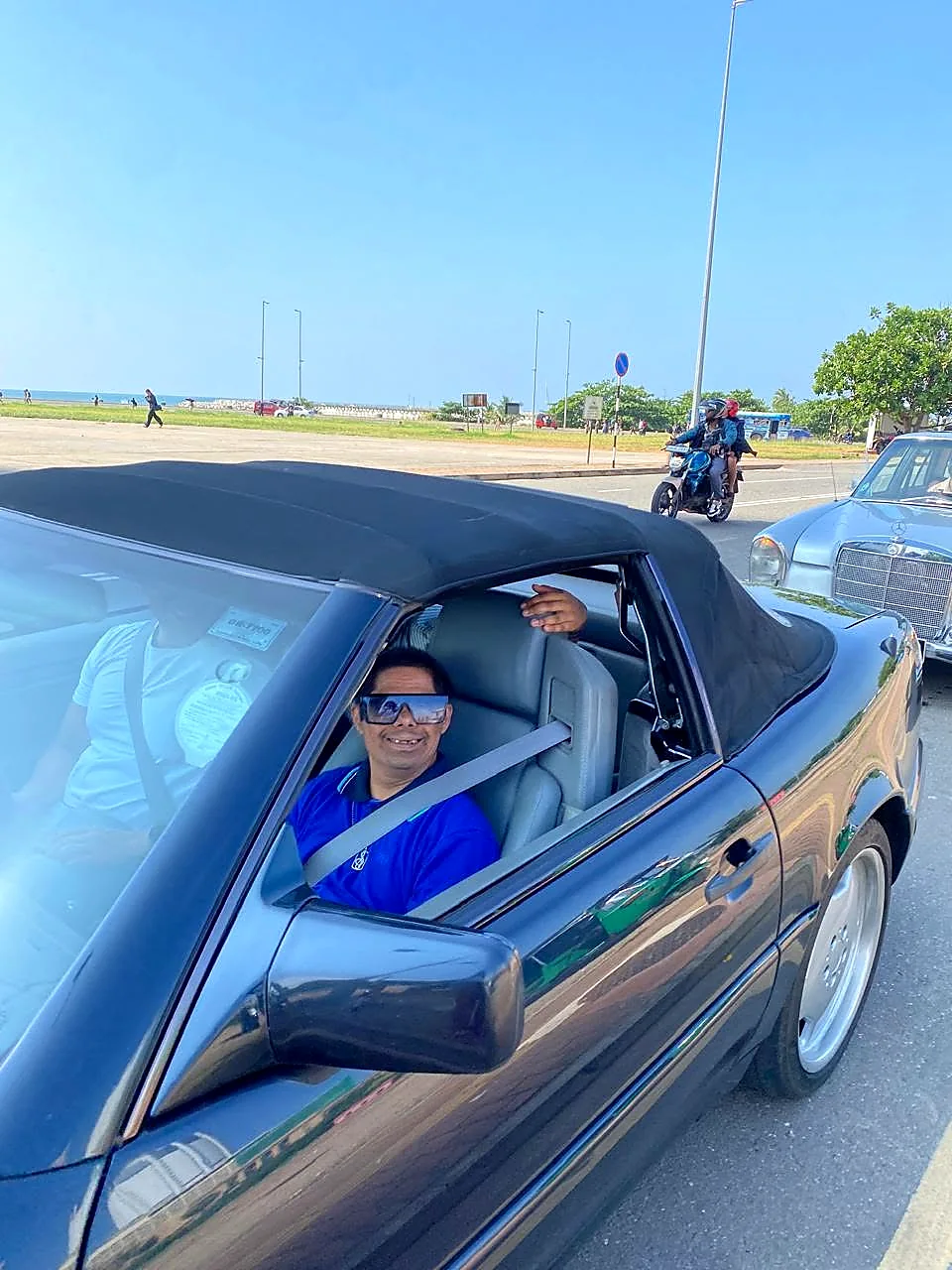 A resident enjoying a classic car outing